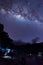 Milky Way landscape. Clearly Milky way above Lake Segara Anak inside crater of Rinjani mountain on night sky.