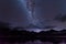 Milky Way landscape. Clearly Milky way above Lake Segara Anak inside crater of Rinjani mountain on night sky.