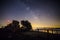 Milky way and Neowise comet in Santuari De La Mare De Deu Del Mont church, Spain