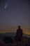 Milky way and Neowise comet in Santuari De La Mare De Deu Del Mont church, Spain