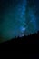 The Milky Way in the night sky at the Sand Beach at Acadia National Park, Maine.