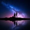 Milky Way. Night starry sky with silhouettes of a couple