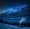 Milky way over cottage in Tatra mountains at night, Poland