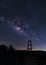 Milky way over rope bridge, Long exposure photograph.with grain