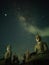 Milky Way over the sky with great of Buddha at Thailand. Noise and dust of star.  Starry in dark night.