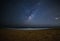 Milky way shine over the sea beach at night