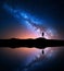 Milky Way and silhouette of a standing alone man
