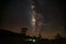 Milky Way and Silhouette of Tree with cloud.Long exposure photograph.With grain