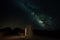 The Milky Way in the sky over an old historic military facility.