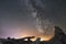 Milky Way and star over a beach with driftwood and rocks. Olympic National Park, Washington