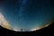 Milky Way and starry sky with clouds