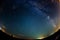 Milky Way and starry sky with clouds