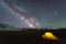 Milky Way on Starry Sky and Yellow Tent