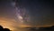 Milky way time lapse and stars rotating over the majestic Italian French Alps in summertime