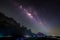 Milkyway over the wooden bridge and pavilion