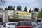 Mill Creek, WA USA - circa June 2022: Exterior view of a Planet Fitness gym on a cloudy day
