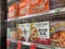 Mill Creek, WA USA - circa May 2022: Angled view of a variety of frozen pizzas for sale inside the freezer section of a Town and