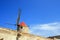 Mill roof on bue summer sky, Sicily