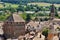 the mill tower of the Abbey of Saint-Pierre and Saint-Paul de Cluny and the Saint-Marcel church in the distance