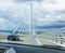 Millau Viaduct in Southern France. People in cars drive over the bridge which is part of the A75-