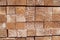 Milled timber background pattern: rectangular posts arranged to