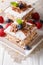 Millefeuille with coffee cream, decorated with berries and mint