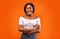 Millennial Afro Girl Smiling At Camera Standing Over Orange Background