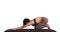 Millennial Asian woman doing yoga on matt on white background