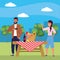 Millennial couple smartphone taking selfie picnic background