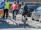 millennial generation doing stunts on bicycles on main roads in stratford upon avon