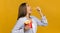 Millennial Girl Eating French-Fries Potatoes Standing Over Yellow Background, Panorama