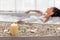 Millennial woman relaxing in bubble bath at home, selective focus on candles and stones