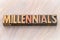 Millennials word abstract in wood type