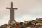 Millennium Cross between houses on hill, Coquimbo, Chile