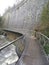 Millennium Walkway with flowing Goyt river below in Torrs Riverside Park, New Mills