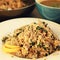 Millet with mushrooms and spinach. Vegan dish.