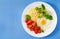 Millet porridge and tomato, cucumber salad and fried eggs.