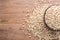 Millet rice or millet grains in wooden bowl put on wooden table