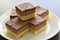 Millionaire`s shortbread, caramel shortcake, or millionaire`s slice.