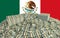 Millions of Dollars - Pile of new 100 Dollar Bills in front of the mexican flag