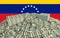 Millions of Dollars - Pile of new 100 Dollar Bills in front of the venezuela flag