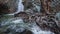 Millomeris waterfall in Troodos mountains, Cyprus. Dramatic plane tree on the bank of Krios river