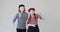 Mime artist couple dancing over white background