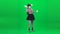 Mime girl using virtual reality glasses. Chroma key. Full length.