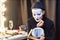 Mime Looking in Mirror Backstage and Doing Makeup