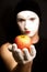 Mime with red apple