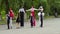 Mimes dance with stilts at the street