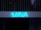 Mina sign in neon shop window