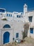 Minaret and blue windows. Sidi Bou Said. Tunisia