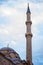 The minaret of the Fatih mosque with the beautiful color of sky in the background